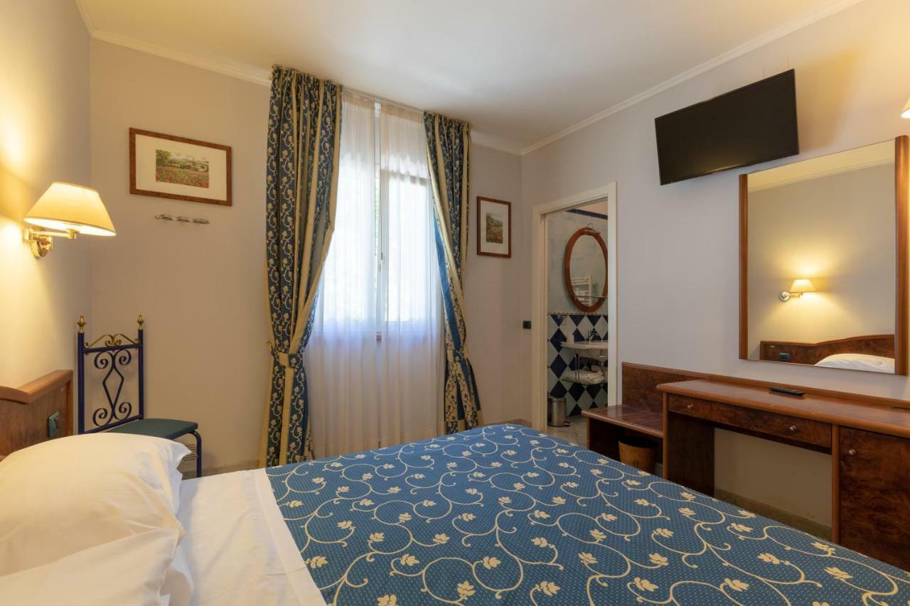 Hotel Villa Elda Ассизи Экстерьер фото